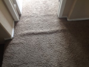 carpet wrinkle in closet doorway